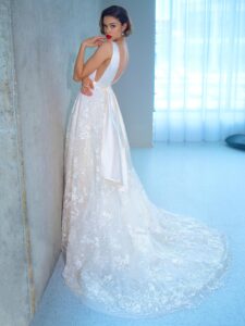 Ball gown wedding dress with floral lace skirt and atlas top
