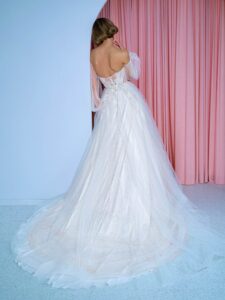 Shimmering lace A-line wedding dress with detachable puff sleeves, available in ivory, ivory-nude