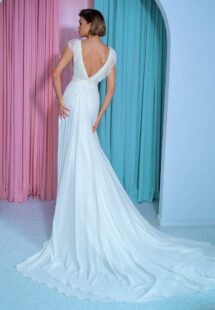 Style #2212L, chiffon sheath wedding gown with embroidered plunging V-neckline and open back, available in ivory