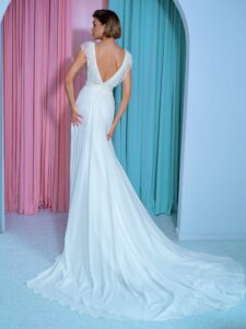 Chiffon sheath wedding gown with embroidered plunging V-neckline and open back