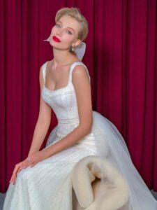 Sequinned lace fit and flare wedding dress with detachable tulle train
