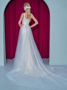 Sequinned lace fit and flare wedding dress with detachable tulle train