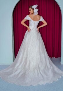 Style #2231L, organza ball gown with off the shoulder straps and floral decor, available in ivory