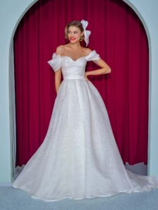 Organza ball gown with off the shoulder straps and floral decor