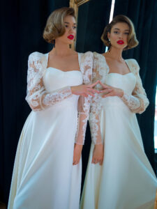 Crepe A-line wedding dress with bishop style sleeves and open back