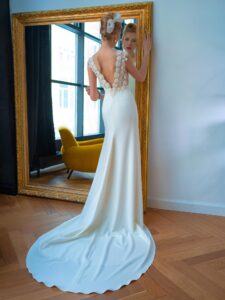 Crepe fit and flare wedding dress with floral embroidered V-back