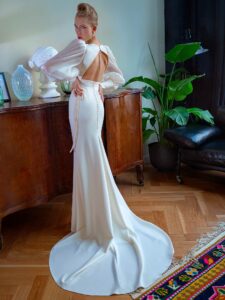 V-neck fit and flare wedding dress with organza bishop-style sleeves