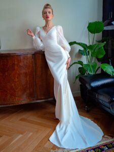 V-neck fit and flare wedding dress with organza bishop-style sleeves