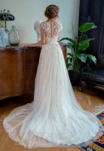Style #2222, A-line wedding dress with 3D floral decor and sequinned floral lace layer, available in ivory