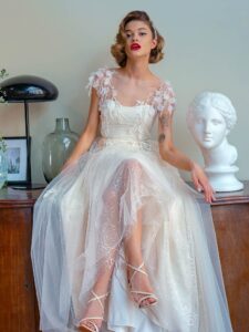 A-line wedding dress with 3D floral decor and sequinned floral lace layer