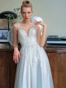 Sequinned lace A-line wedding gown with V-neck and double spaghetti straps