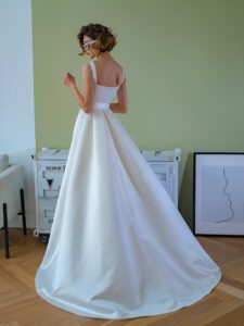 Satin ball gown wedding dress with square neckline and belt
