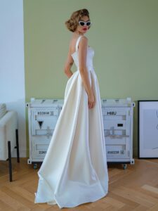Satin ball gown wedding dress with square neckline and belt