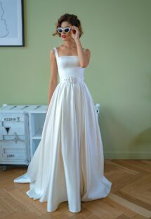 Style #2209-1, satin ball gown wedding dress with square neckline and belt, available in ivory