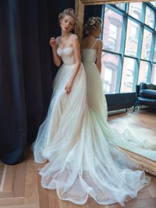 Sparkling lace A-line wedding dress with a beaded bustier top
