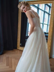 Sparkling lace A-line wedding dress with a beaded bustier top