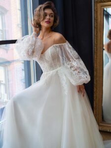 Strapless A-line wedding dress with long puffy sleeves