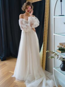 Strapless A-line wedding dress with long puffy sleeves