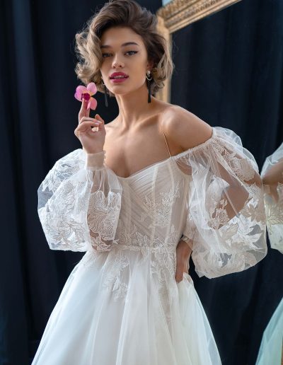 Strapless A-line wedding dress with long puffy sleeves