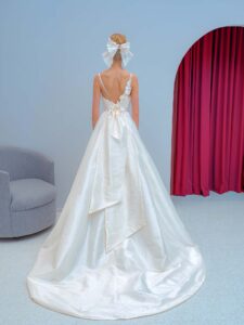 Style #2219L, Taffeta ball gown wedding dress with spaghetti straps and 3D floral decor, available in ivory