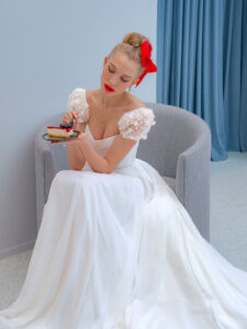 Chiffon sheath wedding dress with embroidered cap sleeves and beaded back