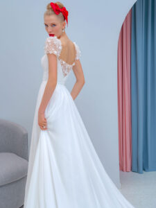 Chiffon sheath wedding dress with embroidered cap sleeves and beaded back