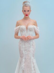 Shimmering lace fit and flare wedding dress with detachable off the shoulder sleeves and tulle train, available in ivory, ivory-nude