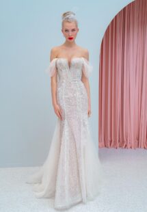 Style #2223, shimmering lace fit and flare wedding dress with detachable off the shoulder sleeves and tulle train, available in ivory, ivory-nude