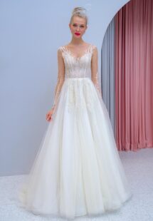 Style #2204L, long-sleeve A-line wedding dress with floral embroidery, available in ivory