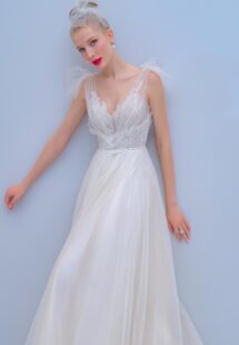 Style #2201L, A-line wedding dress with bow straps and floral embroidered top, available in ivory, dark ivory