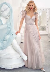 Style #632, shimmering A-line evening gown with long sleeves and puffed shoulders; available in grey-powder