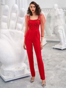 Style #643-8, three quarter sleeve jumpsuit with leaf embroidery and pockets; available in red, pink, black