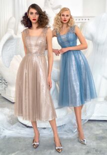 Style #644, tulle A-line evening dress with floral applique and sequin underlayer; available in coffee, azure, ivory, black, purple, pink