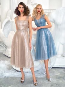 Style #644, tulle A-line evening dress with floral applique and sequin underlayer; available in coffee, azure, ivory, black, purple, pink