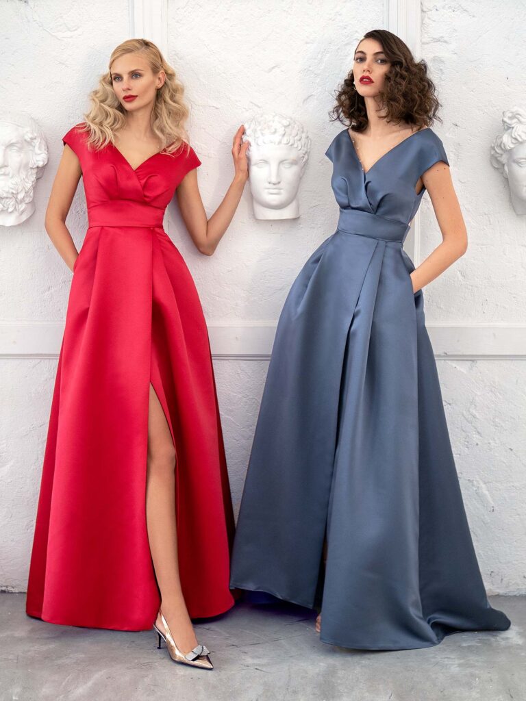 Style #650, satin A-line evening dress with keyhole back and pockets; available in steel-dark blue, raspberry, black, ivory, eggplant, violet