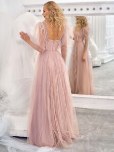 Style #651, long-sleeve A-line evening dress with ruffles and floral embroidery; available in powder, cherry, ivory, pink, purple, azure, grey-blue