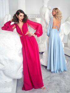 Style #652, long-sleeve chiffon evening gown with plunging neckline, illusion side cutouts and open back; available in berry, white, ivory, yellow, peach, powder, purple, scarlet, pink, cherry, mint, blue, azure, green, cornflower, smoky, black