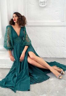 Style #657, chiffon sheath gown with balloon style lace sleeves and slit down the skirt; available with an open or closed back; in green, ivory, cherry, powder, purple, blue, black