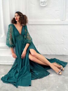 Style #657, chiffon sheath gown with balloon style lace sleeves and slit down the skirt; available with an open or closed back; in green, ivory, cherry, powder, purple, blue, black