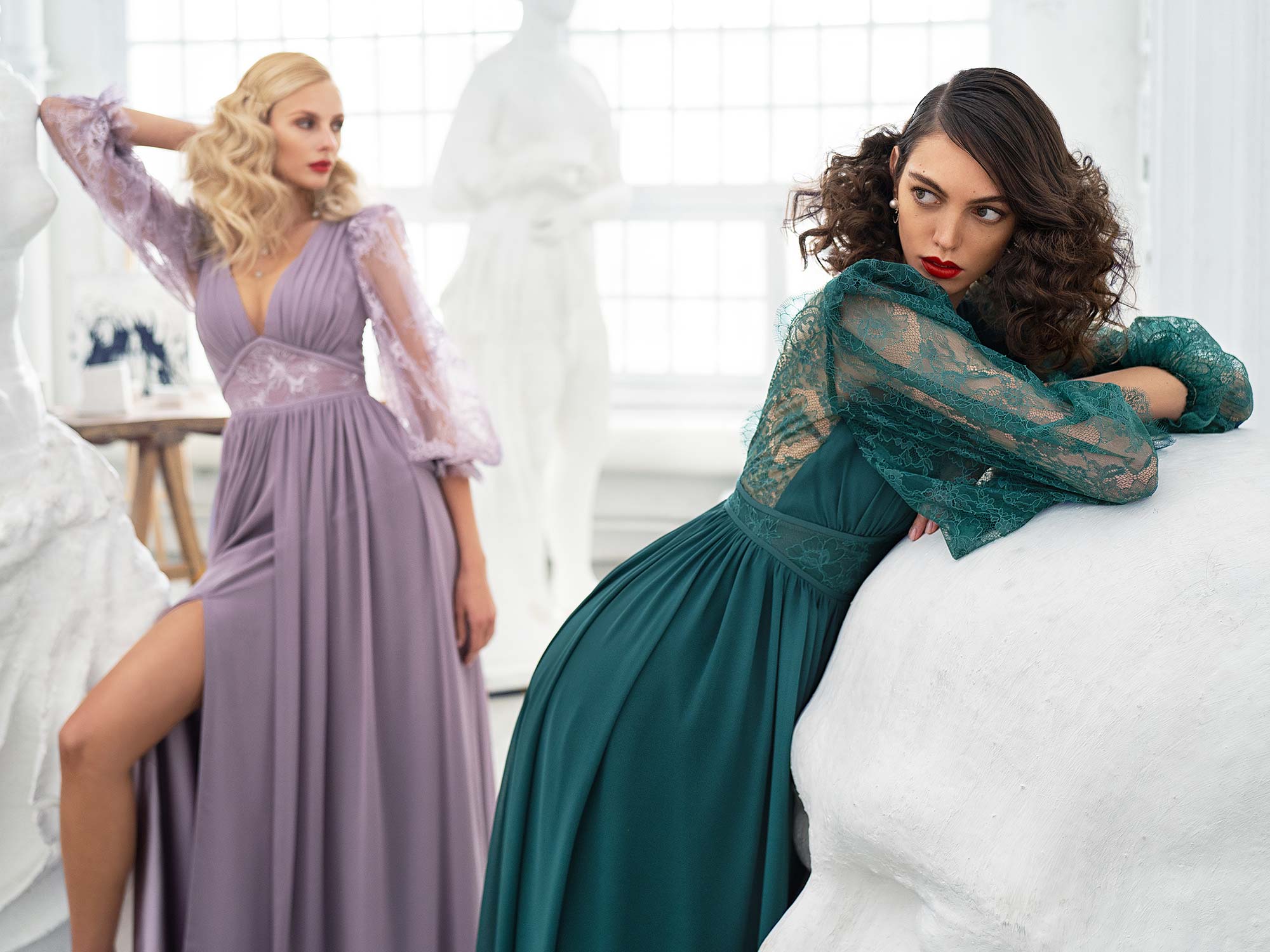 Style #657, chiffon sheath gown with balloon style lace sleeves and slit down the skirt; available with an open or closed back; in green, ivory, cherry, powder, purple, blue, black