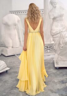 Style #658, chiffon evening dress with a plunging neckline, open back and beaded waistline; available in yellow, ivory, peach, blue, black, smoky, green, azure, cherry, mint, purple, powder