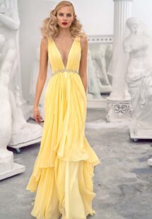 Style #658, chiffon evening dress with a plunging neckline, open back and beaded waistline; available in yellow, ivory, peach, grey-blue, black, smoky, green, dusty-turquoise, azure, cherry, mint, purple, powder