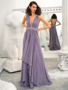 Style #658, chiffon evening dress with a plunging neckline, open back and beaded waistline; available in yellow, ivory, peach, blue, black, smoky, green, azure, cherry, mint, purple, powder