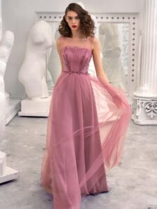 Style #659, A-line formal dress with illusion straight neckline, beaded top and V-back; available in pink, ivory, nude