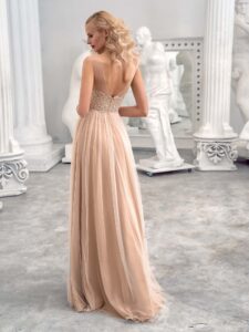 Style #659, A-line formal dress with illusion straight neckline, beaded top and V-back; available in pink, ivory, nude