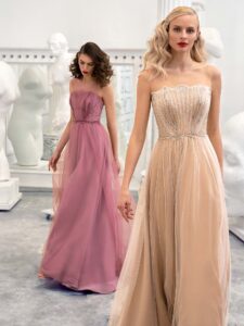 Style #659, A-line formal dress with illusion straight neckline, beaded top and V-back; available in pink, ivory, nude