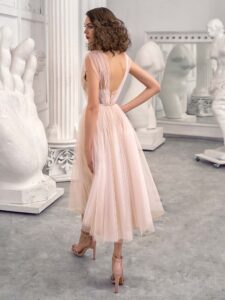 Style #660-1, tulle A-line evening dress with floral embroidered top and flowy skirt; available in midi or maxi length; in ivory-nude, pink-nude