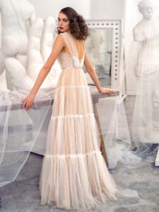 Style #660, tulle A-line evening dress with floral embroidered top and layered skirt; available in ivory-nude, pink-nude
