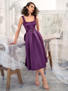 Style #662a, satin A-line cocktail dress with square neckline and pockets; available in midi or maxi length; in eggplant, ivory, raspberry, black, steel -dark blue, violet