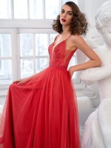 Style #663b, spaghetti strap A-line evening dress with deep plunge neckline and beaded floral embroidery; available in midi or maxi length; in cherry, ivory, purple, azure, black, powder, blue